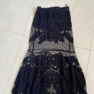 Mesh black skirt with shorts and floral design!